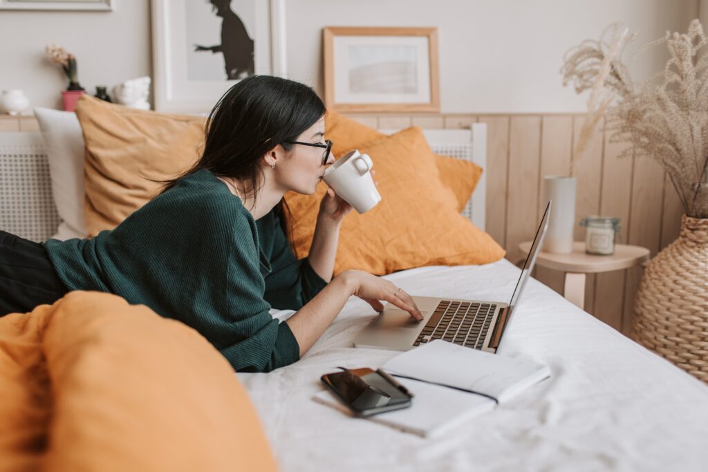 Woman working on bed